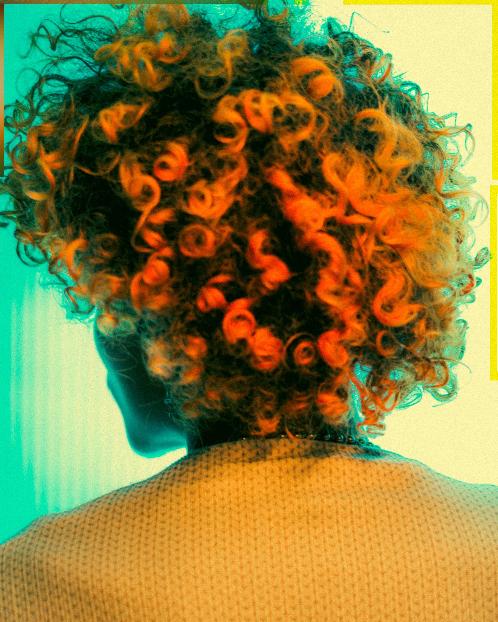 Stylist working attentively on a client's hair